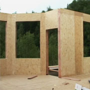 установка панелей для стен, управляющий брус, монтаж стен
